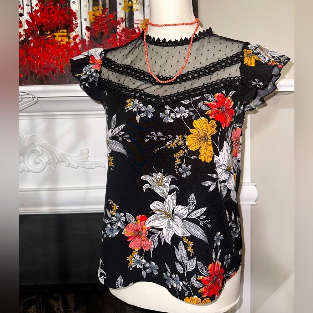 Floral lace blouse with stone necklace